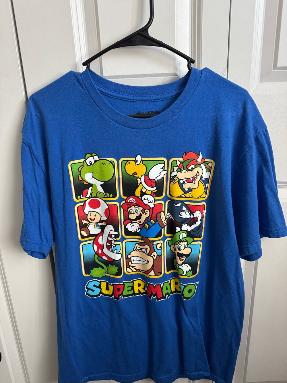 🌟 5 for $20 or $7
Nintendo Super Mario Blue Graphic